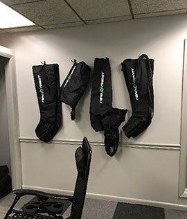 Dynamic Compression Sleeves Hanging on Wall